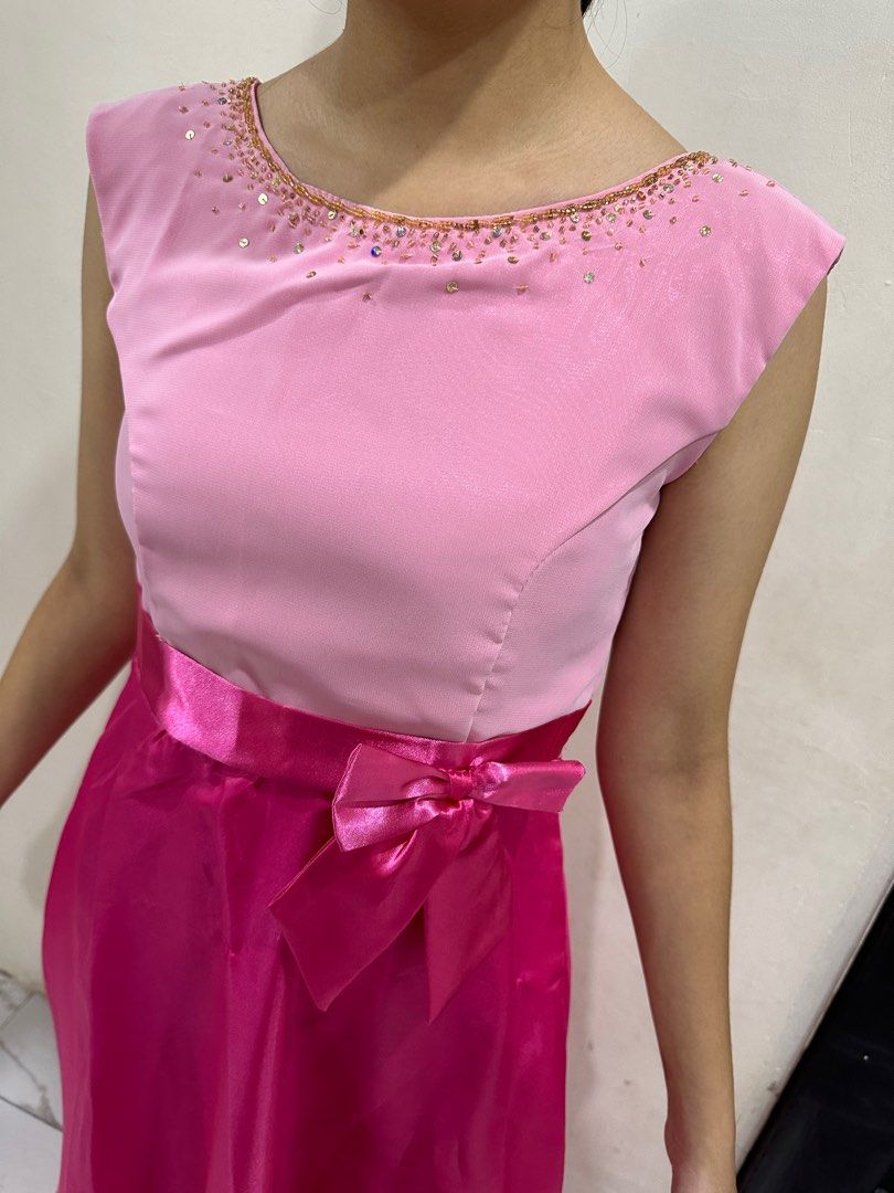 Pink Formal Dress with Bow (Category: Dresses) located in Manila. Submitted by azshopmnl (Listing ID 1406430687, Image 2). Description: - Elegant pink formal dress - Light pink beaded bodice - Darker pink floor-length skirt - Satin ribbon bow at the waist - Lace-up back for adjustable fit - Ideal for special occasions.