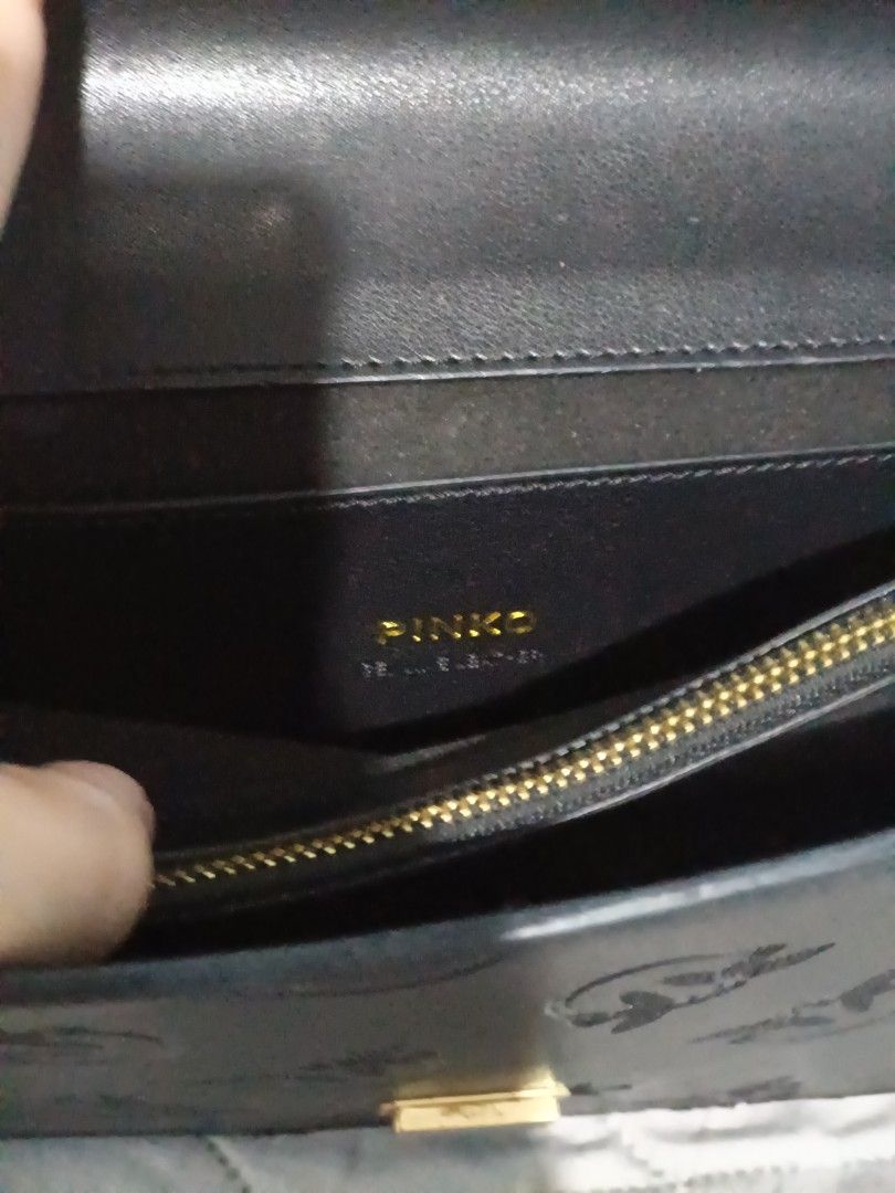 Pinko Love Bag Black (Category: Luxury Bags & Wallets) located in San Fernando. Submitted by artemisolshop_0704 (Listing ID 1406335735, Image 2). Description: - Pinko Love Bag - Black leather exterior - Gold-tone chain strap - Iconic bird buckle - Embossed bird pattern - Interior zip pocket with Pinko logo - Magnetic flap closure.
