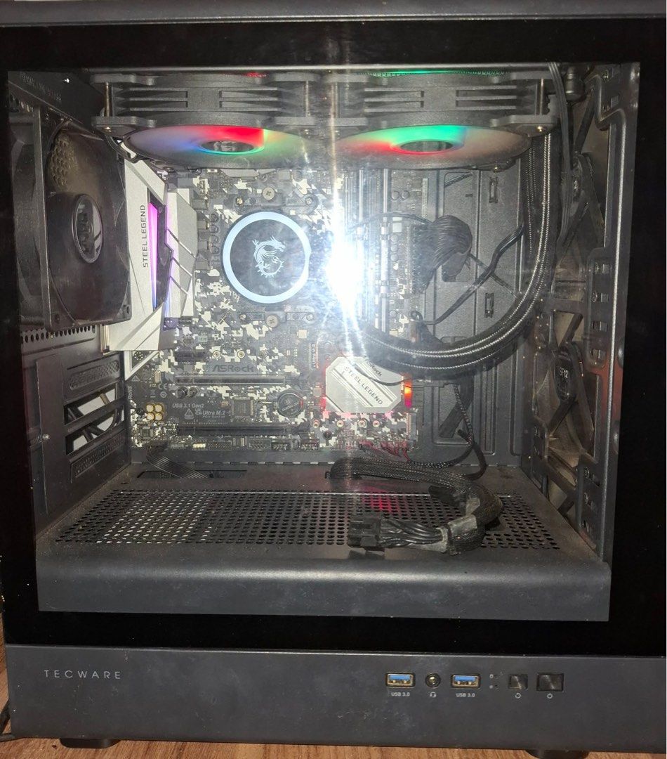 Ready for Upgrade Gaming PC (Category: Computer Parts) located in Cavite. Submitted by eve05__ (Listing ID 1406403419, Image 3). Description: FS: Ready for Upgrade System unit Specs: Ryzen 5 4600g Asrock b450m steel legend with receipt and box T force vulcan 2x8 gb ram 3200 mhz with receipt and box Corsair CV550 80+ bronze Tecware Timber M Matx case with receipt MSI Mag Coreliquid b240 AIO Cooler with receipt 4 case fans non-rgb SSD not included 
