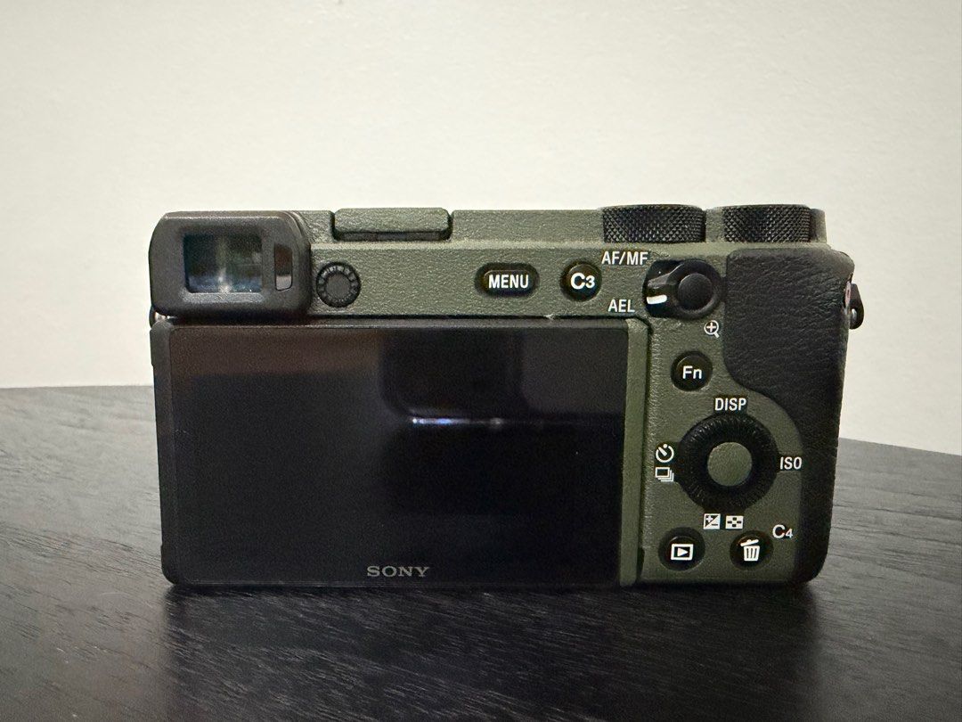 Sony a6600 body (Category: Cameras) located in Makati City. Submitted by JLSplashWater (Listing ID 1406285563, Image 3). Description: Sony a6600 (body) ✅ Mint condition ✅ 6k SC only ✅ With body cap ✅ Battery ✅ Original Box ✅ No issue / scratches / dents ✅ With olive green skin ❌ No Viewfinder eyecup .
