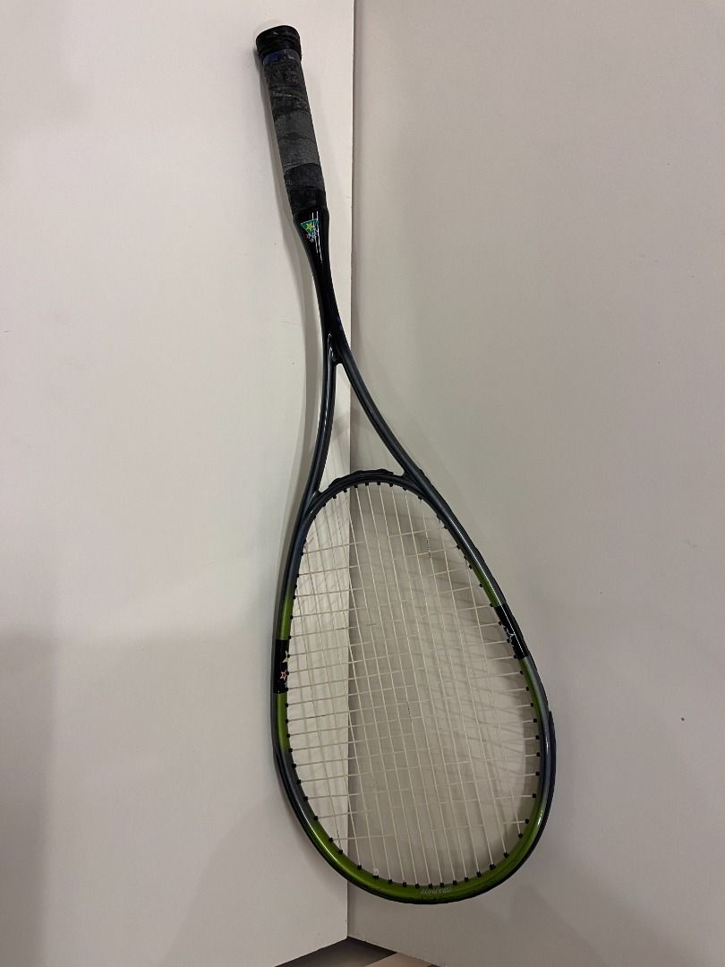 Squash Racket (Category: Racket & Ball Sports) located in Ipoh. Submitted by hyperbarichealth (Listing ID 1406440299, Image 1). Description: Rakan Muda Squash racket with a black and green frame. Hardly used - kept in store for several years. May need to re-grip. The strings intact. It is suitable for casual play..