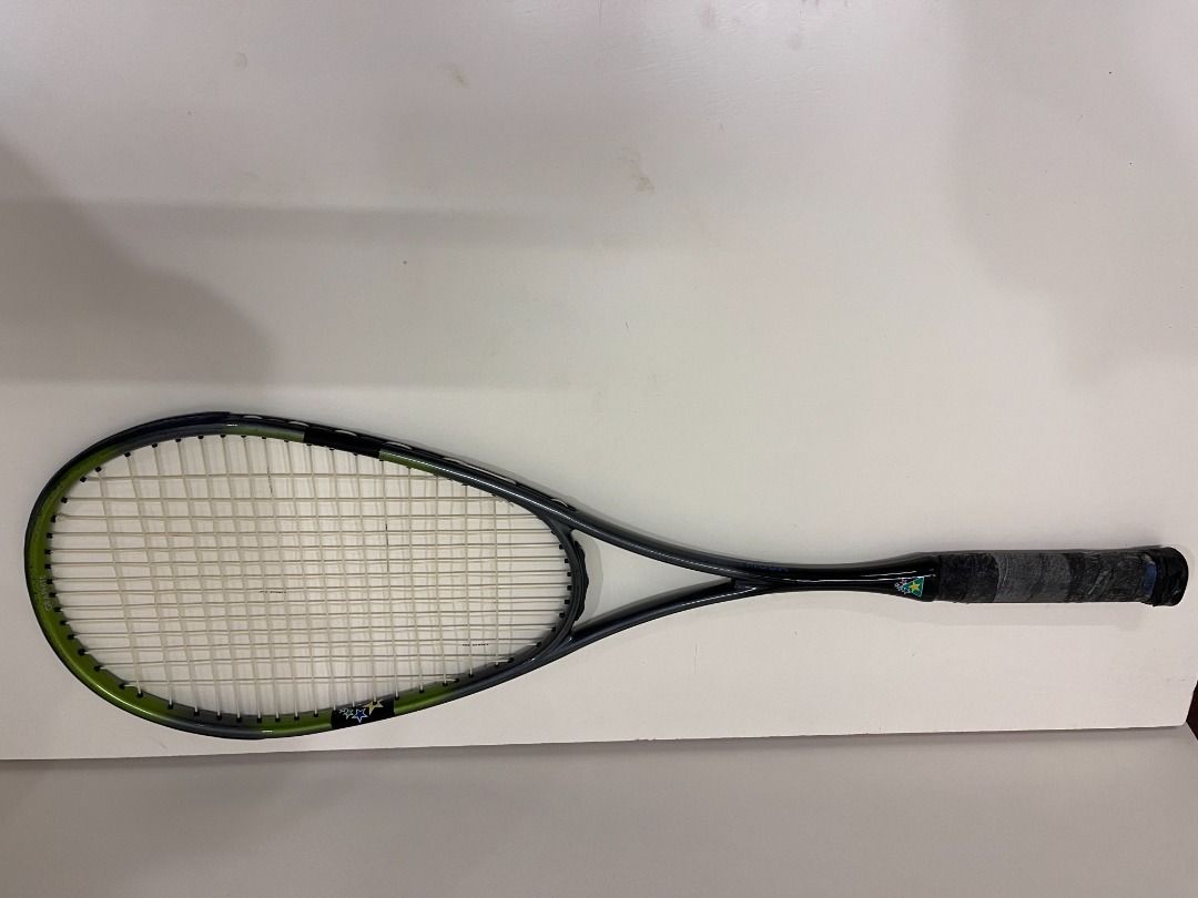 Squash Racket (Category: Racket & Ball Sports) located in Ipoh. Submitted by hyperbarichealth (Listing ID 1406440299, Image 2). Description: Rakan Muda Squash racket with a black and green frame. Hardly used - kept in store for several years. May need to re-grip. The strings intact. It is suitable for casual play..