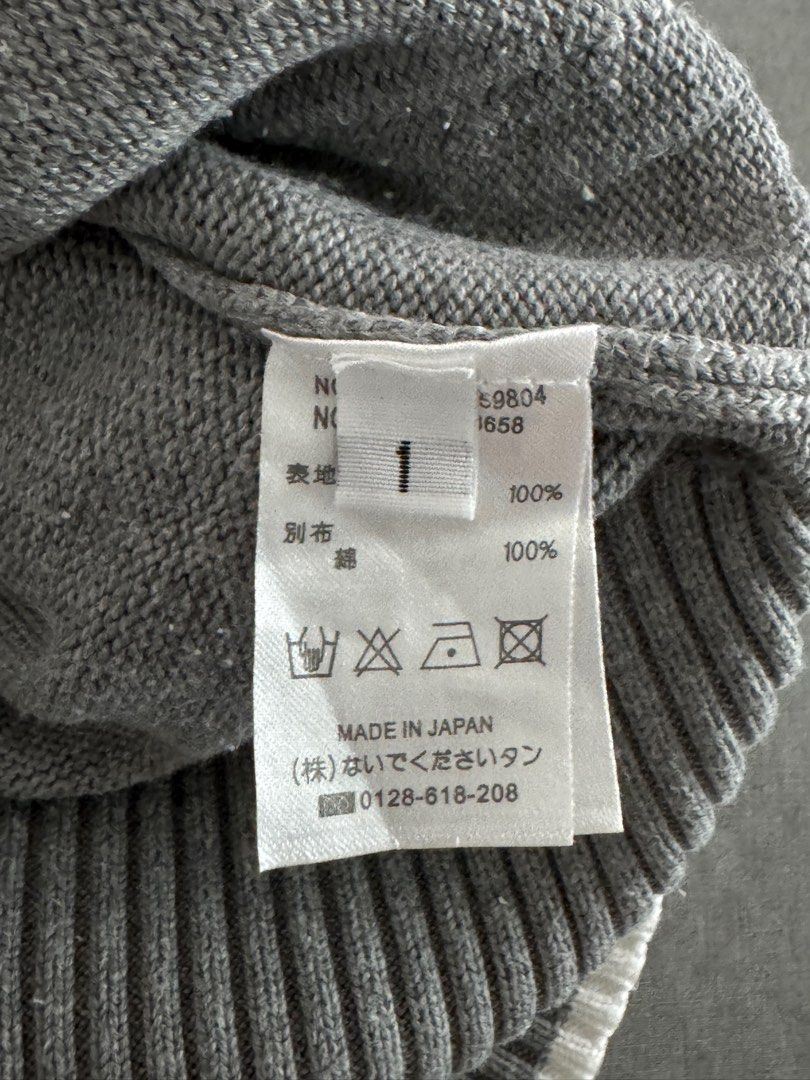Thom Browne Grey Cardigan (Category: Luxury Apparel) located in Pasig City. Submitted by heattsupply (Listing ID 1406293392, Image 3). Description: Thom Browne grey cardigan. Features white trim, four-bar detail, V-neck, button closure, and front pockets. Made in Japan. Size 1. 100% cotton. Measurements: 21.75W x 27.5L.