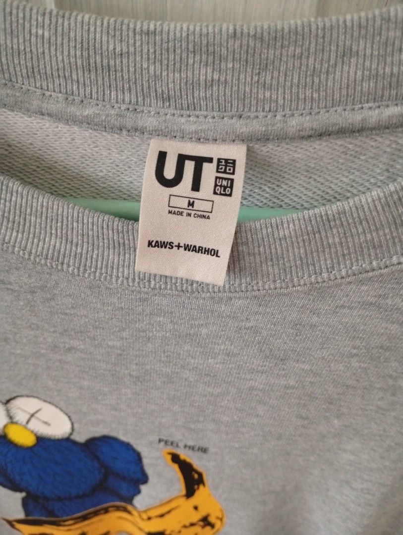 Uniqlo UT KAWS + WARHOL Sweatshirt (Category: Coats, Jackets and Outerwear) located in Caloocan City. Submitted by llen. (Listing ID 1406319427, Image 2). Description: - Uniqlo UT sweatshirt - Gray color - Size: M - Design: KAWS + WARHOL - Crew neck - Long sleeves.