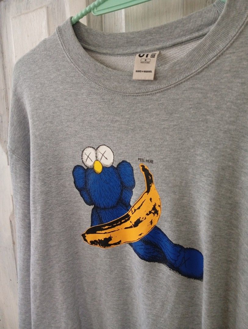 Uniqlo UT KAWS + WARHOL Sweatshirt (Category: Coats, Jackets and Outerwear) located in Caloocan City. Submitted by llen. (Listing ID 1406319427, Image 1). Description: - Uniqlo UT sweatshirt - Gray color - Size: M - Design: KAWS + WARHOL - Crew neck - Long sleeves.