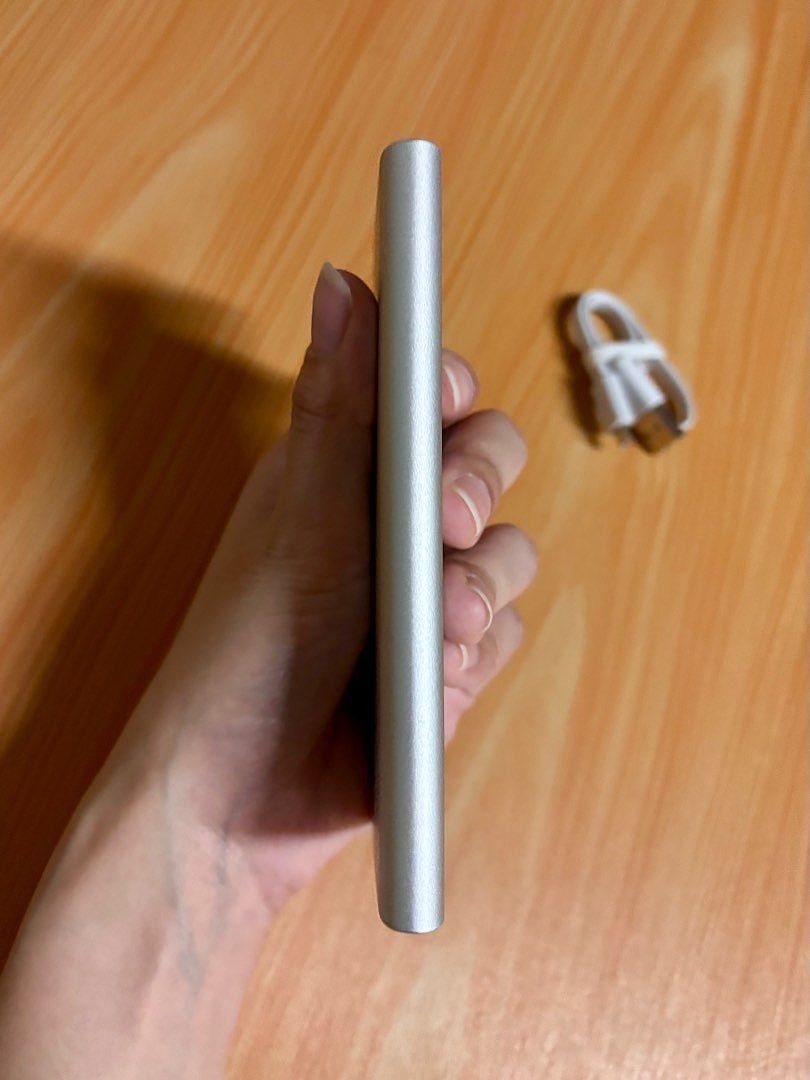 Xiami Power Bank (5000mAh) (Category: Batteries & Power Banks) located in Valenzuela. Submitted by caulfieldscollection (Listing ID 1406219436, Image 3). Description: Battery Capacity: 5000mAh 3.7V 18.5 Wh Sleek and thin design Input: 5.0V / 2.0A Output 1: 5.1V / 2.1A Comes with USB cord Rarely use anymore Works just fine Still in good condition No damages RFS: Decluttering DM me if interested..