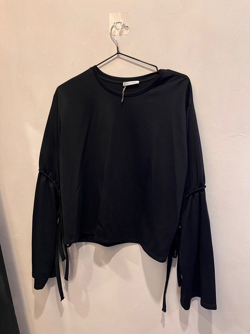 Zara Black Tie Sleeve Top (Category: Blouses) located in Quezon City. Submitted by disposing (Listing ID 1406369203, Image 1). Description: Needs washing as this item was stored for months/years. All items listed are personally owned & used Gcash/BDO For same-day delivery via Lalamove/Grab or self-collection only at Xavierville 2 Quezon City 1.