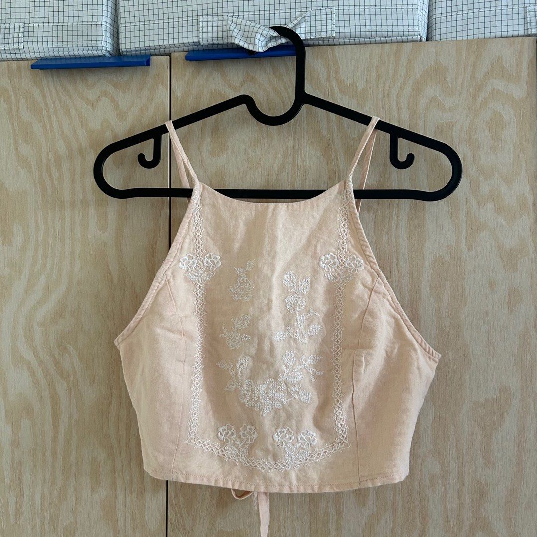 Zara Embroidered Halter Top (Category: Others Tops) located in Pasig City. Submitted by choomchoom (Listing ID 1406289342, Image 1). Description: - brand new, never worn. only removed the tag because i had it washed - rfs: style doesnt match my body frame - no returns/refunds for purchased items.