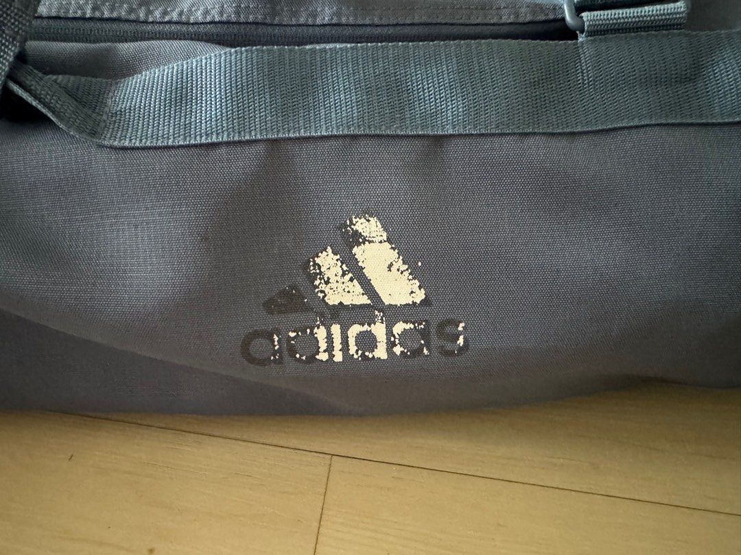 Addidas Original Large size - Duffle bag (Category: Backpacks) located in Quezon City. Submitted by JCshops (Listing ID 1406481937, Image 2). Description: in excellent condition Only the word Adidas (as shown on photo is fading) Shoe compartment (never been used) for clothes only. So inside is all clean No holes. Used for a few times only .