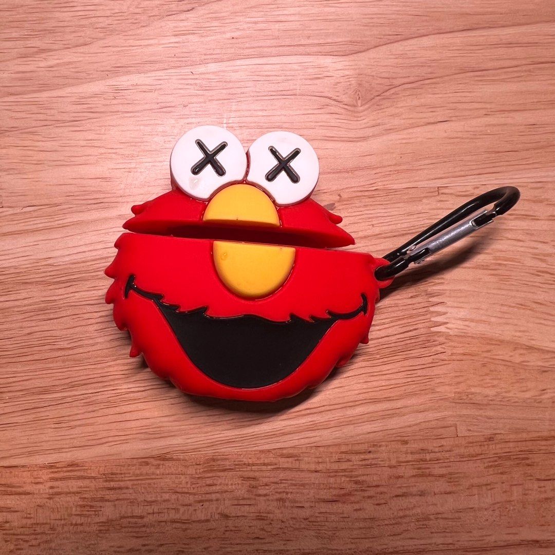 Airpods 1/2 Elmo x Kaws inspired case (Category: Cases & Sleeves) located in Pasig City. Submitted by katricem (Listing ID 1406615991, Image 1). Description: Airpods 1/2 Elmo x Kaws inspired case silicon/rubber material used for less than a year with free carabiner rfs: decluttering last price listed ‼️ x asking for last price, haggling percentage discount automatically applied if buying multiple items from my page☺️ 💸 MOP: gcash, bpi 📦 MOD: Gr