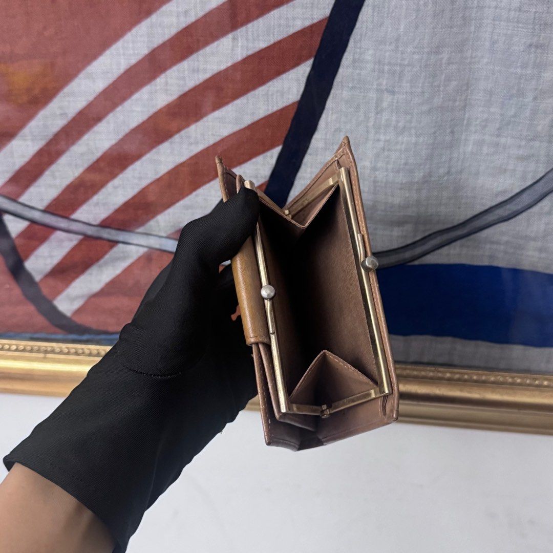 Authentic celine bi fold kiss lock wallet (Category: Luxury Bags & Wallets) located in Rizal. Submitted by houseofbell (Listing ID 1406551482, Image 2). Description: Still good condition No flaws.