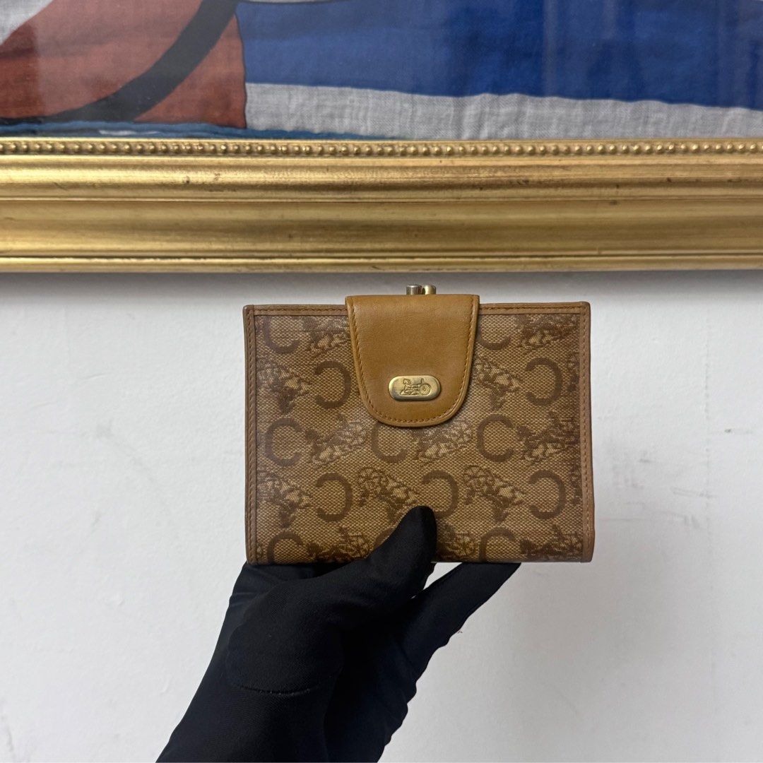 Authentic celine bi fold kiss lock wallet (Category: Luxury Bags & Wallets) located in Rizal. Submitted by houseofbell (Listing ID 1406551482, Image 1). Description: Still good condition No flaws.
