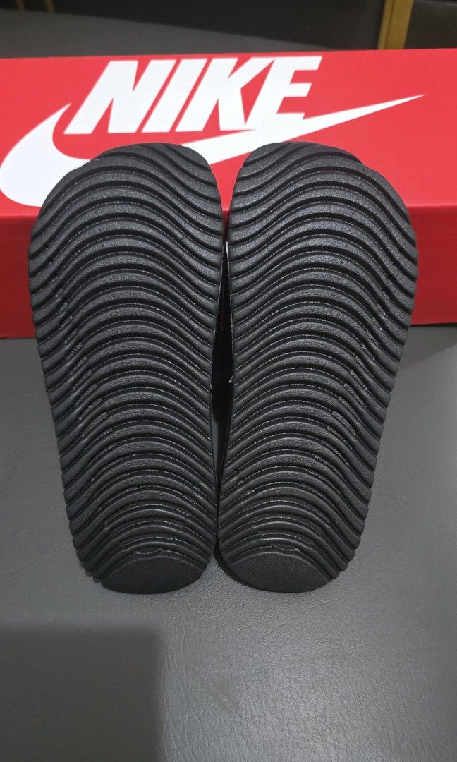 Authentic Nike Kawa Slides - BRAND NEW (Category: Babies & Kids Fashion) located in Tagaytay City. Submitted by thrift.trend (Listing ID 1406541417, Image 2). Description: - We mistakenly ordered the wrong size from the app 😐 - Size: 13C/19 CM - Box included Pay today, ship tomorrow. ‼️ Mine Now, Pay Now ‼️ First To Pay Basis ‼️ No when worn photos ‼️.
