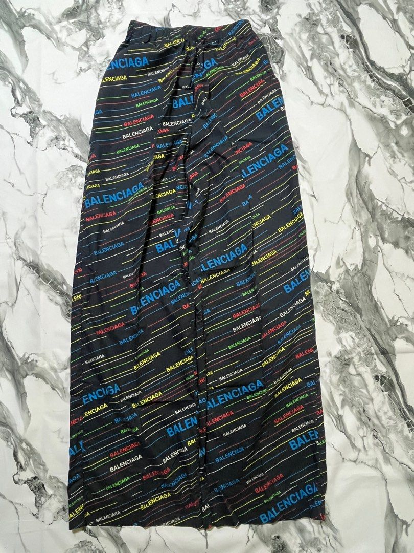 Balenciaga Logo Print Pants XS (Category: Luxury Apparel) located in Caloocan City. Submitted by yungbluhh (Listing ID 1406525833, Image 1). Description: - Balenciaga pants - All-over logo print - Black base color - Multi-color Balenciaga logo - Size: XS 44L 30-42Waist - Elastic waistband - Small pocket .