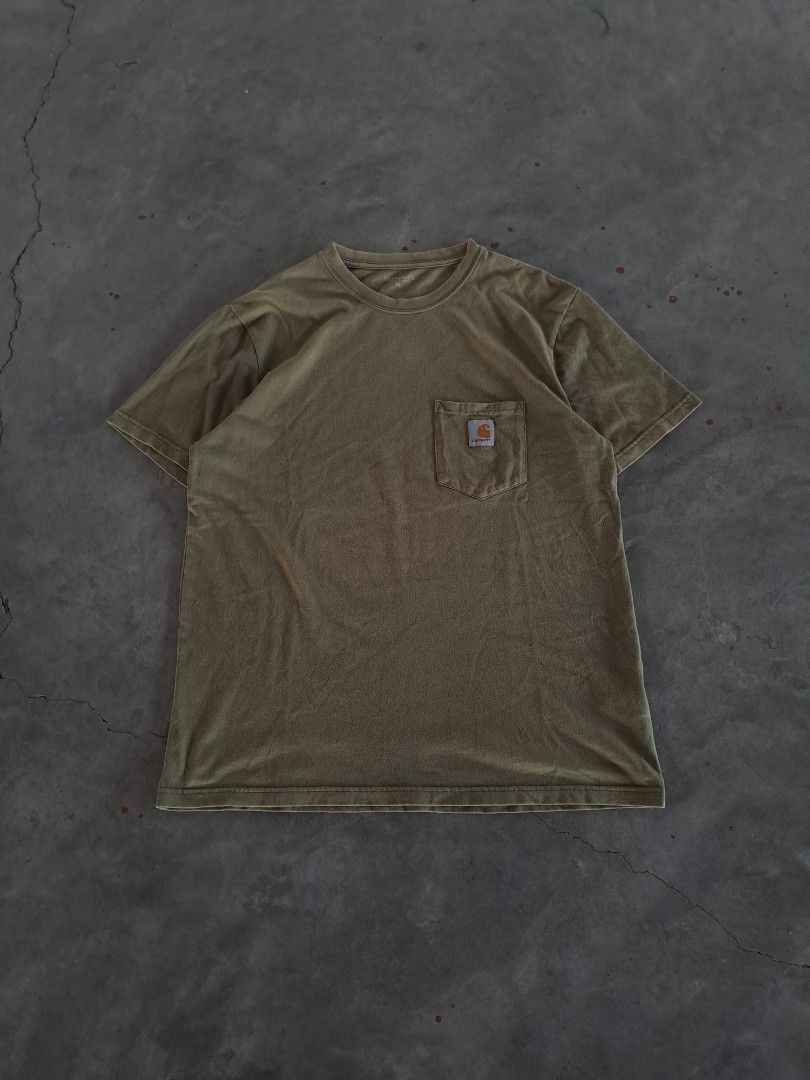 CARHARTT MOSS GREEN WIP POCKET TEE (Category: Activewear) located in Hagonoy. Submitted by favelagmay (Listing ID 1406467808, Image 1). Description: 28 x 22 color rate 9 slight stain.