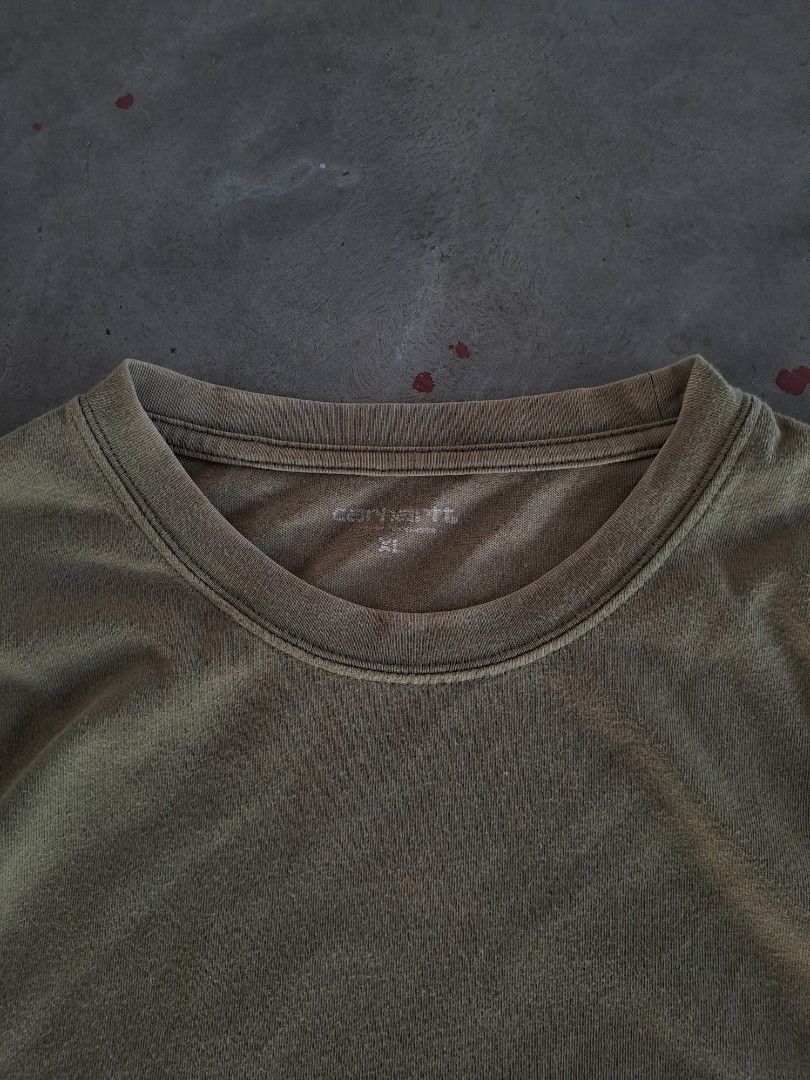 CARHARTT MOSS GREEN WIP POCKET TEE (Category: Activewear) located in Hagonoy. Submitted by favelagmay (Listing ID 1406467808, Image 2). Description: 28 x 22 color rate 9 slight stain.