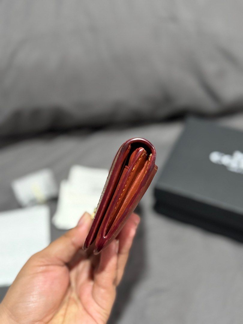 Coach Wallet (Category: Luxury Bags & Wallets) located in Bulacan. Submitted by kcbd08 (Listing ID 1406587282, Image 3). Description: Bought for ₱8450 With box and receipt from rustan .