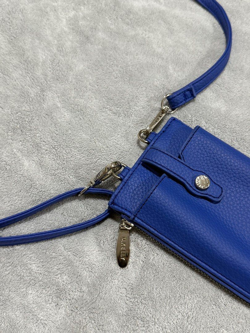 D. Kelly Japan Cp Sling Wallet (Category: Luxury Bags & Wallets) located in San Fernando. Submitted by maindaysanik2x (Listing ID 1406556536, Image 3). Description: D.Kelly Japan Royal Blue Color Silver Hardware Ship via J&t Gcash Payment.