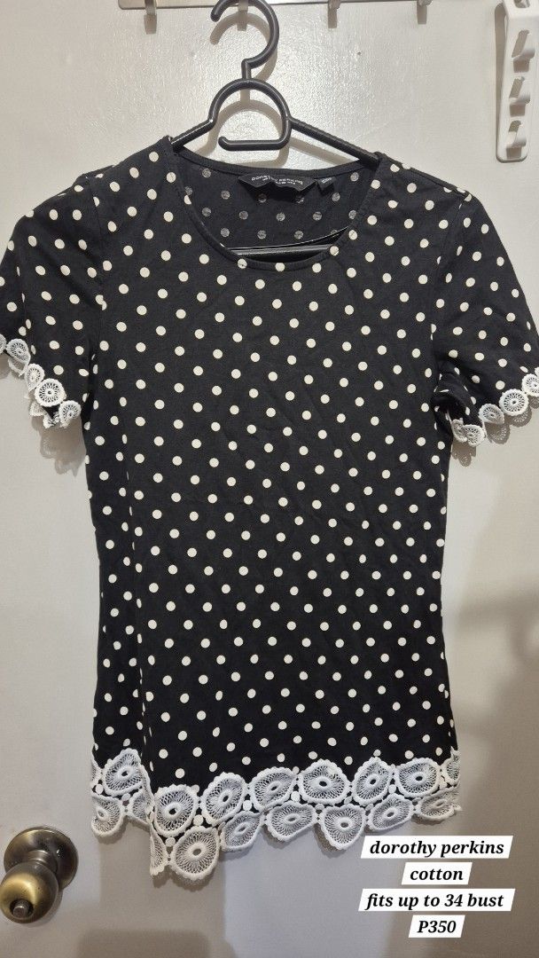 Dorothy Perkins black & white Polka Dot Top (Category: Blouses) located in Manila. Submitted by gcuraming (Listing ID 1406494205, Image 1). Description: - Dorothy Perkins polka dot top - Made of cotton - Features a round neckline - Short sleeves with lace detailing - Fits up to 34-inch bust - Size: US 4, EURO 36, UK 8 shipping from sampaloc manila or makati.