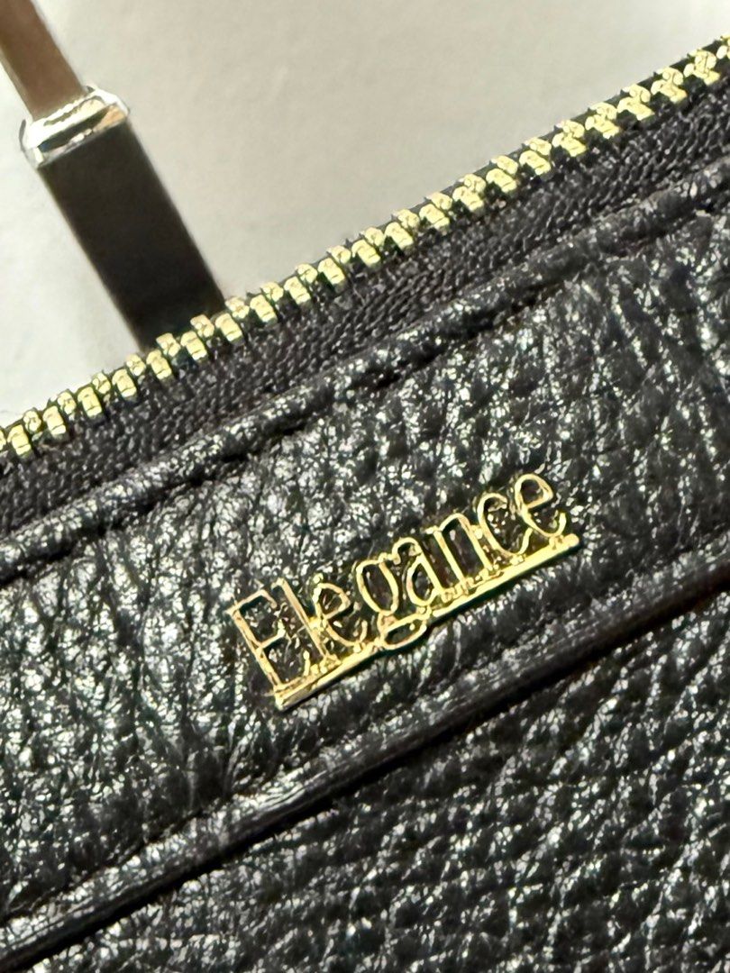 Elegance Paris Black Label Two-way leather Bag (Category: Luxury Bags & Wallets) located in Davao. Submitted by rebaggedph (Listing ID 1406511973, Image 2). Description: Elegance Paris Black Label Leather Tote A refined and classic everyday bag designed with clean lines, pebbled leather, and gold hardware. From the brand’s premium Black Label line, this piece features upgraded materials, a structured silhouette, and quiet-luxury styling. Perfect 
