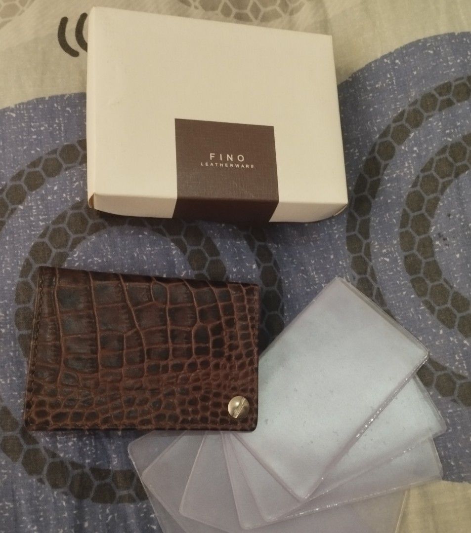 Fino Leatherware Card Holder (Category: Wallets & Card holders) located in Caloocan City. Submitted by myprelovedbutlovedshop (Listing ID 1406527801, Image 1). Description: Never used. Nakatago lang kaya amoy kulob. As is where is basis. Payment first policy via Gcash. No meet ups. Delivery/Shipping via J&T, Grab or LBC. Negotiable. Questions? feel free to ask..