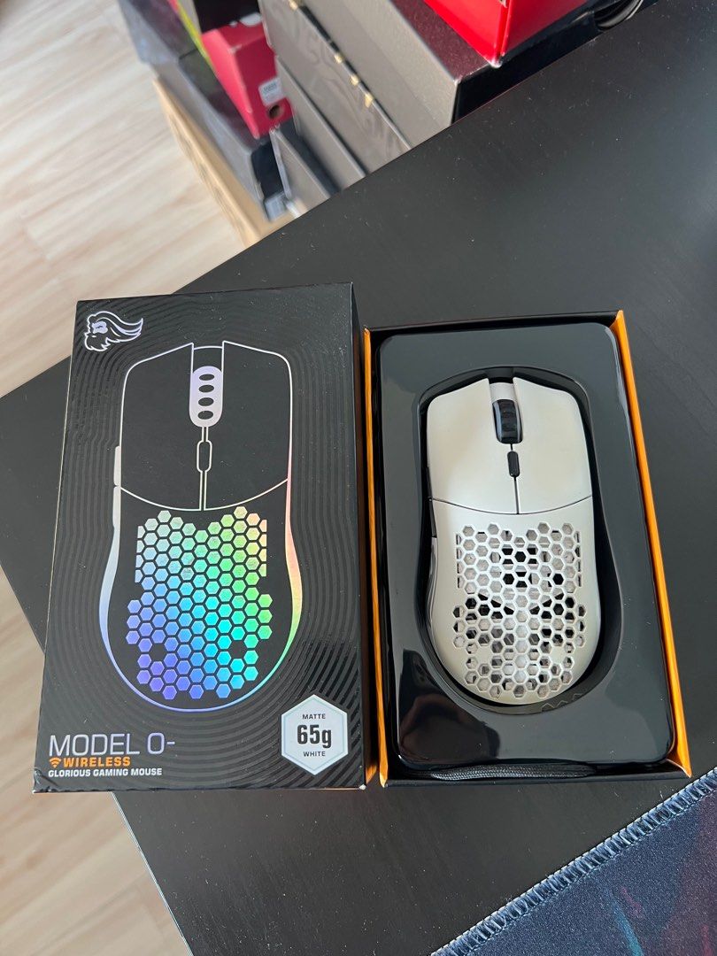 Glorious Model O- Wireless Gaming Mouse (Category: Mouse & Mousepads) located in Quezon City. Submitted by elgabeu (Listing ID 1406588623, Image 2). Description: Glorious Model O- Wireless RGB All working no issues Used with slight yellowing Complete with box 📍: Timog/Kamias QC 📦: Lalamove, Grab, LBC.