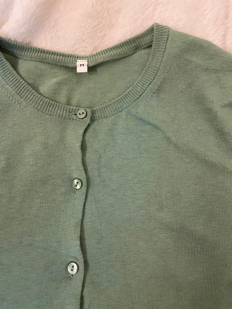 Green Cardigan Basic (Category: Coats, Jackets and Outerwear) located in Kuala Lumpur. Submitted by lvrmin (Listing ID 1406570960, Image 2). Description: - Green cardigan - Size: M - Round neck - Button closure - Long sleeves - Ribbed hem and cuffs P23 L23.