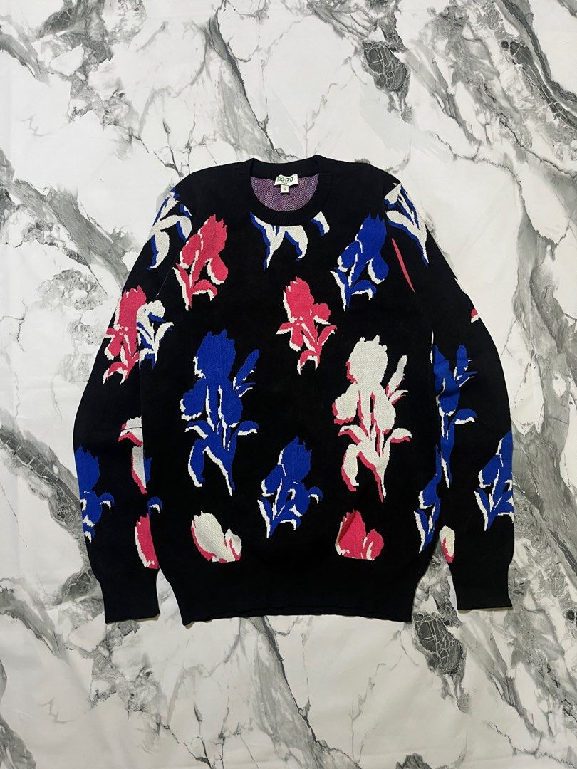 Kenzo Floral Print Sweater - S (Category: Coats, Jackets and Outerwear) located in Caloocan City. Submitted by yungbluhh (Listing ID 1406512855, Image 1). Description: - Kenzo sweater with floral print - Size: Small - Crew neck design - Long sleeves - Ribbed collar, cuffs, and hem - Interior lining with patterned design - Authentic Kenzo.