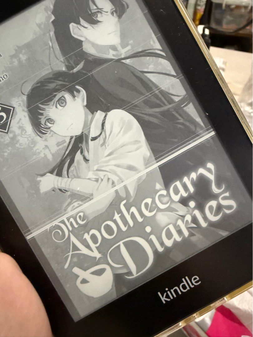 Kindle PPW 10th gen (Category: E-Readers) located in Bacoor. Submitted by ahhleey (Listing ID 1404311927, Image 2). Description: Issue: lines in the screen shown in the pic. Includes usb cable and box NO ADS ☺️.