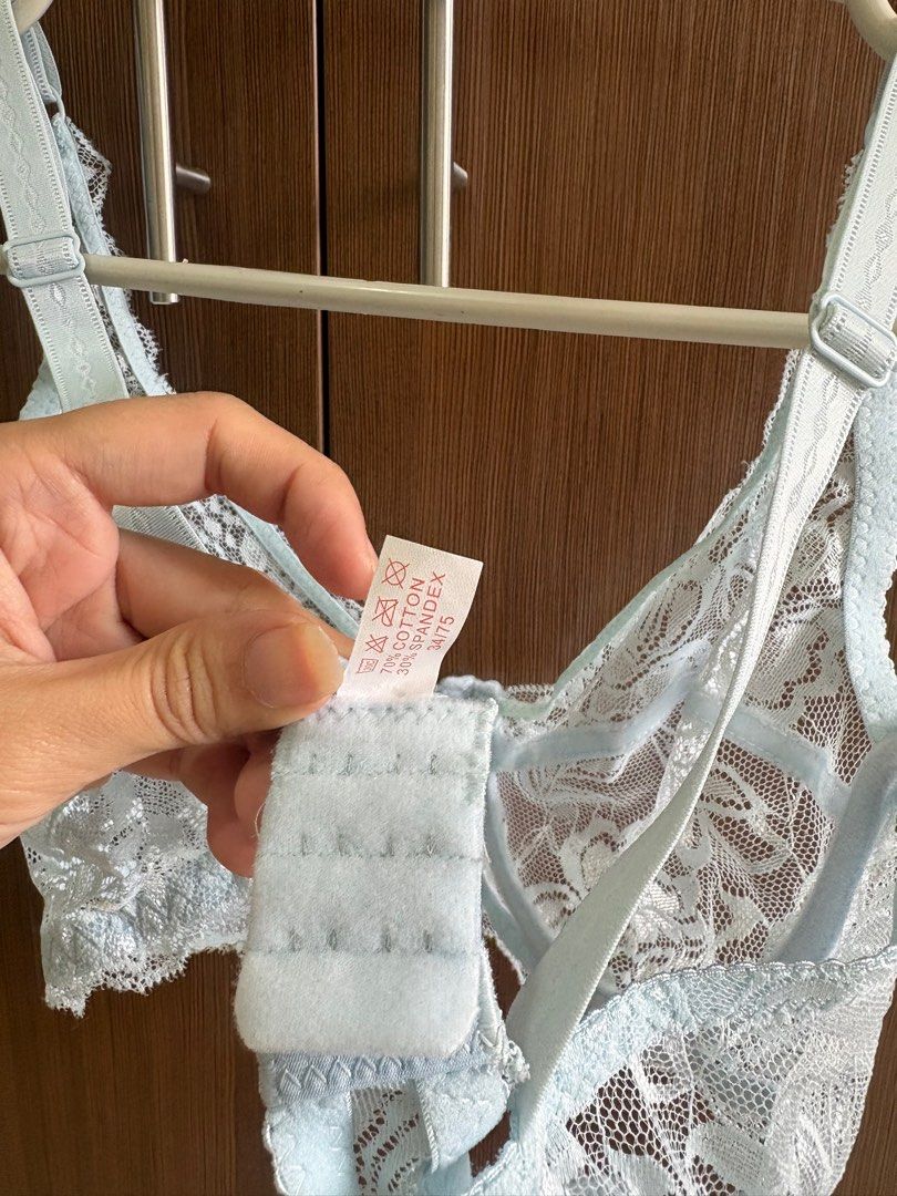 Lace Bra (Category: Undergarments & Loungewear) located in Manila. Submitted by pinpoints (Listing ID 1406495039, Image 3). Description: - Light blue lace bra - Size: 34/75 - Features adjustable straps - Hook-and-eye closure at the back - Material: Lace (97% cotton, 3% spandex).