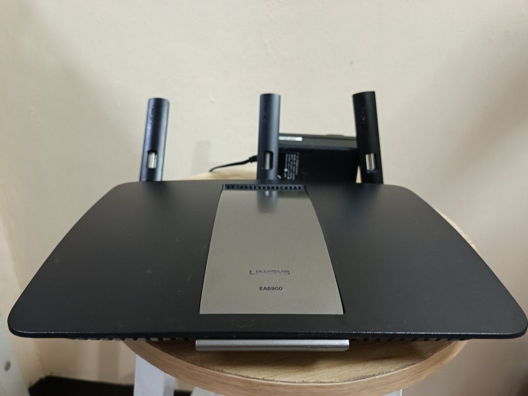 Linksys EA6900 Router (Category: Networking) located in Quezon City. Submitted by glempol-1 (Listing ID 1406551761, Image 1). Description: no issue The Linksys EA6900 is a dual-band AC1900 Wi-Fi router with speeds up to 1300 Mbps on the 5 GHz band and 600 Mbps on the 2.4 GHz band. It features four Gigabit LAN ports, a USB 3.0 port, and a USB 2.0 port for network storage or printers. The router includes Linksys Smart Wi-Fi for managing network set