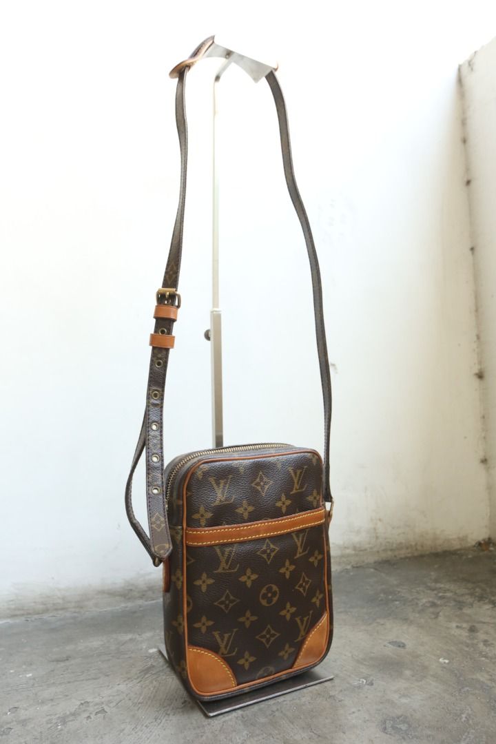 Louis Vuitton - Marc Jacobs - 2003 - LV Monogram Danube (Category: Luxury Bags & Wallets) located in Manila. Submitted by graymatter_ (Listing ID 1406492380, Image 3). Description: Louis Vuitton - Marc Jacobs - 2003 - LV Monogram Danube Condition: Rank A Flaws: Minor Signs of Usage(Minor Darkening of Vachetta, Light Scuffs, Ink Stains on Lining) Material: Coated Canvas, Vachetta Leather Made in: France Dimensions Height: 21cm Width: 15.5cm Depth: