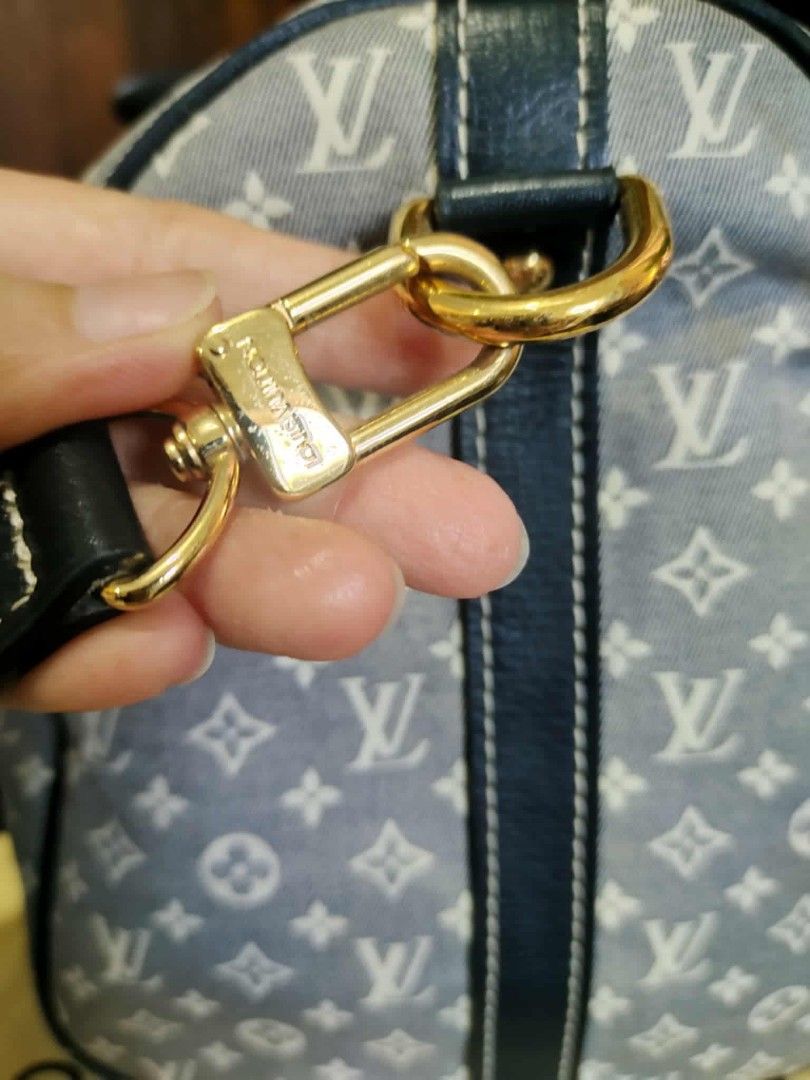 Louis Vuitton Monogram Denim Speedy 30 (Category: Luxury Bags & Wallets) located in Cebu City. Submitted by tlisurplus (Listing ID 1406539259, Image 3). Description: - Authentic Louis Vuitton Speedy 30 handbag - Denim monogram canvas - Navy leather trim and handles - Detachable shoulder strap included - Comes with padlock and keys - Gold-tone hardware - Fabric lining - Includes dust bag.