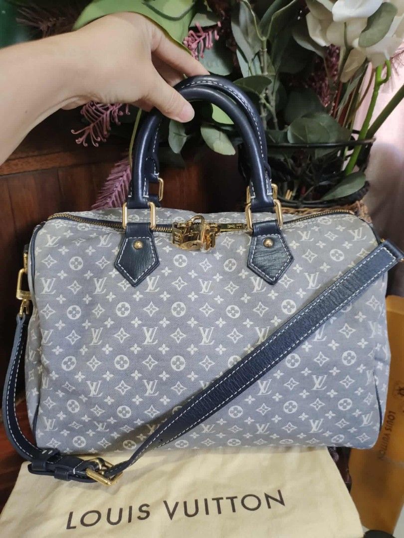 Louis Vuitton Monogram Denim Speedy 30 (Category: Luxury Bags & Wallets) located in Cebu City. Submitted by tlisurplus (Listing ID 1406539259, Image 1). Description: - Authentic Louis Vuitton Speedy 30 handbag - Denim monogram canvas - Navy leather trim and handles - Detachable shoulder strap included - Comes with padlock and keys - Gold-tone hardware - Fabric lining - Includes dust bag.