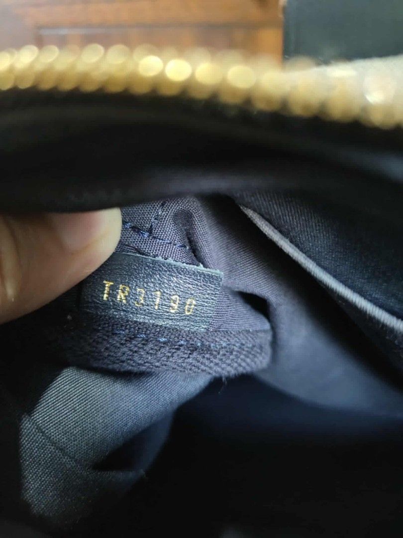 Louis Vuitton Monogram Denim Speedy 30 (Category: Luxury Bags & Wallets) located in Cebu City. Submitted by tlisurplus (Listing ID 1406539259, Image 2). Description: - Authentic Louis Vuitton Speedy 30 handbag - Denim monogram canvas - Navy leather trim and handles - Detachable shoulder strap included - Comes with padlock and keys - Gold-tone hardware - Fabric lining - Includes dust bag.