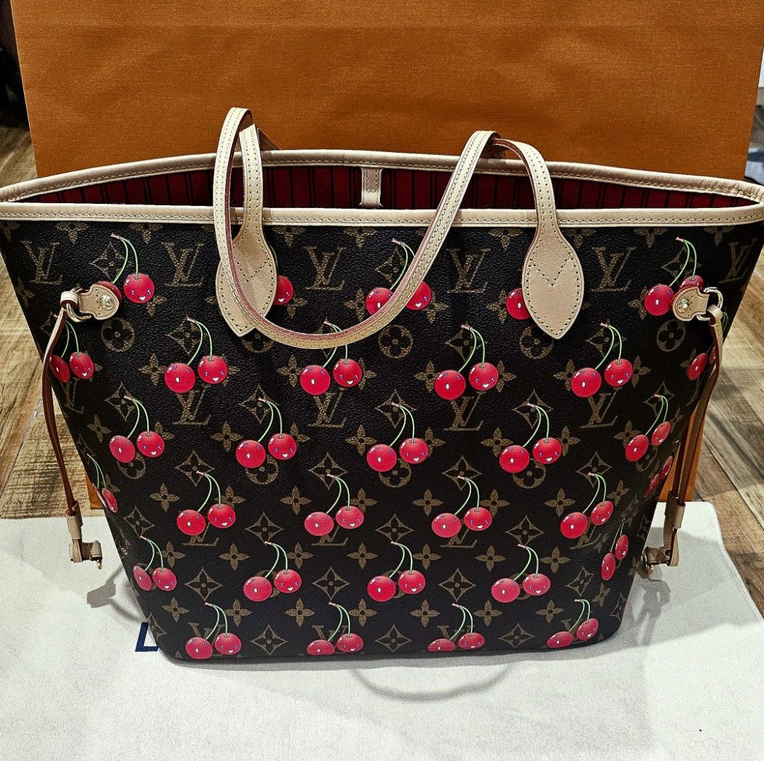 Louis Vuitton Murakami Cherry Blossom Neverful (Category: Luxury Bags & Wallets) located in Quezon City. Submitted by bagsplusmore (Listing ID 1406563312, Image 1). Description: - Authentic Louis Vuitton Murakami Cherry Blossom Tote Bag - Features the classic LV monogram pattern - Adorned with vibrant cherry blossom prints limited edition - Spacious interior with red fabric lining - A stylish and functional pouch inside comes in full set, visa ma