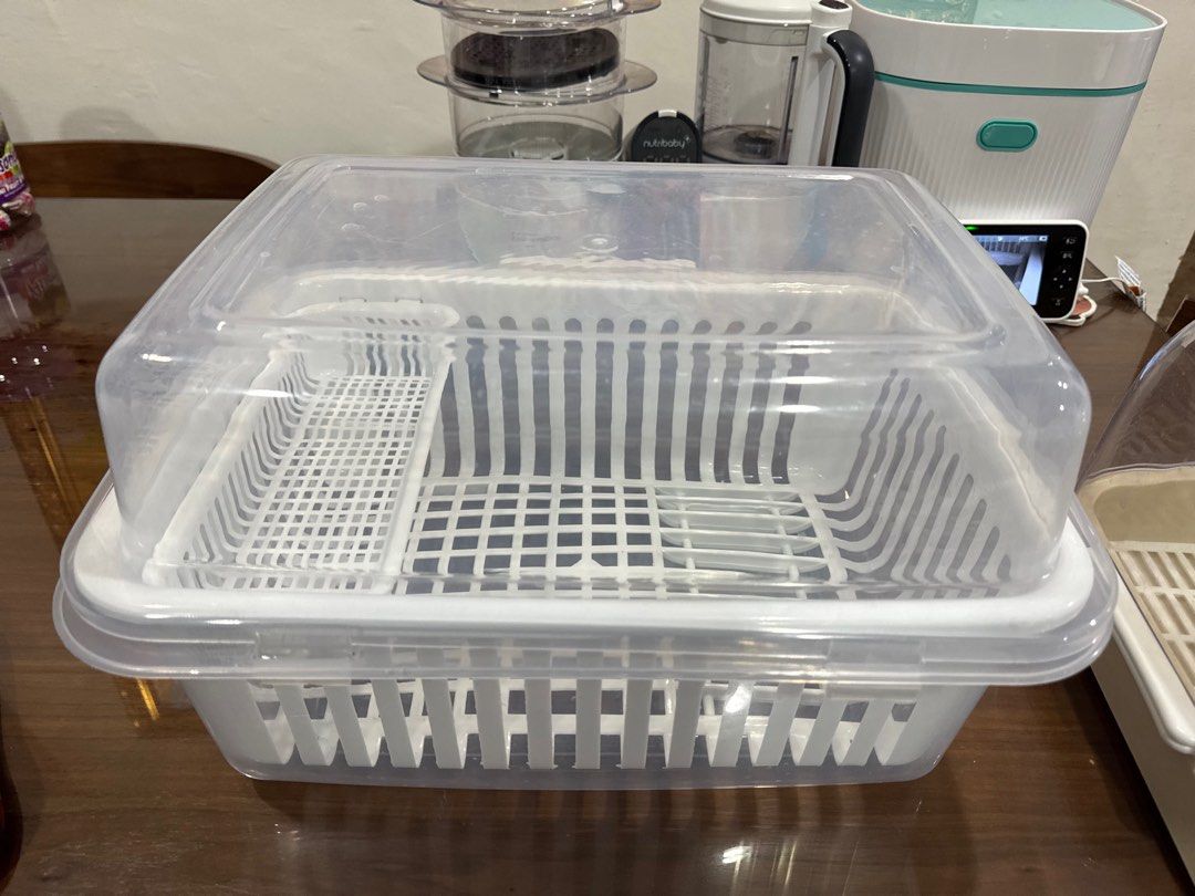 Megabox Covered Dish Rack (Category: Other Kitchenware & Tableware) located in Muntinlupa City. Submitted by goldinmygarage (Listing ID 1406635053, Image 3). Description: Used for a week lang while on travel Used with dry baby bottles Never po itong nabasa - White plastic dish rack - Clear cover to keep dishes clean - Main compartment for plates and bowls - Separate section for utensils - Practical for drying dishes and keeping your kitchen tidy.
