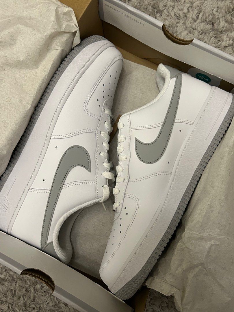 Nike Air Force 1 '07 Smoke Grey White (Category: Sneakers) located in Caloocan City. Submitted by luckynumber18 (Listing ID 1406494429, Image 2). Description: - Nike Air Force 1 '07 - White leather upper - Smoke grey swoosh and outsole - Size: 10.5 US men's / 12 US women's - Includes original box - Perfect for everyday wear.