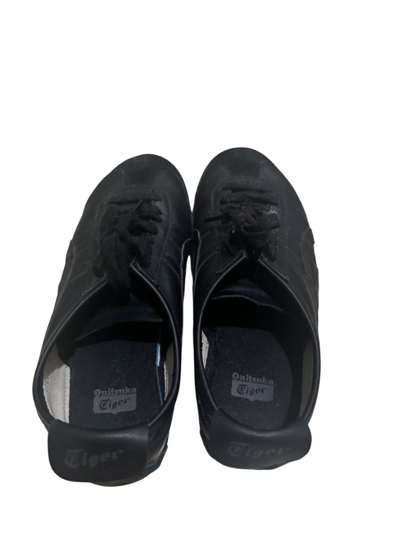 Onitsuka Tiger Mexico 66 Black Sneakers (Category: Sneakers) located in Quezon City. Submitted by gellotin123 (Listing ID 1406572153, Image 2). Description: - Onitsuka Tiger Mexico 66 Sneakers - Color: Black - Size: EU 39 / UK 6 / US 8 - Condition: Good - Iconic design - Versatile and stylish.