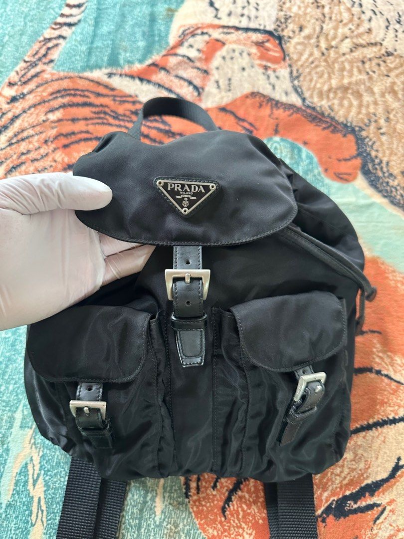 Prada Nylon Backpack (Category: Luxury Bags & Wallets) located in Los Banos. Submitted by streetwear.collections (Listing ID 1406486163, Image 3). Description: Prada Nylon Backpack Rank A Authentic Bag Only, No any other Inclusions Php 15,000 Thanks! .