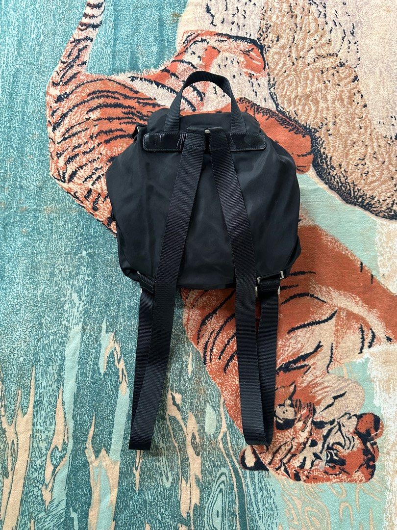 Prada Nylon Backpack (Category: Luxury Bags & Wallets) located in Los Banos. Submitted by streetwear.collections (Listing ID 1406486163, Image 2). Description: Prada Nylon Backpack Rank A Authentic Bag Only, No any other Inclusions Php 15,000 Thanks! .