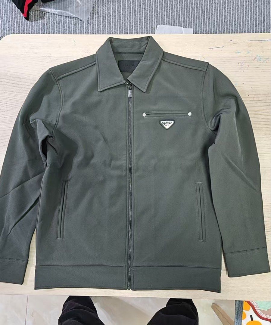 Prada Zip-Up Jacket (Category: Coats, Jackets and Outerwear) located in Angeles City. Submitted by caerus8 (Listing ID 1406590347, Image 1). Description: Brand new. Wrong size for me. See size M from the last photo for the size guide. Price is still negotiable..