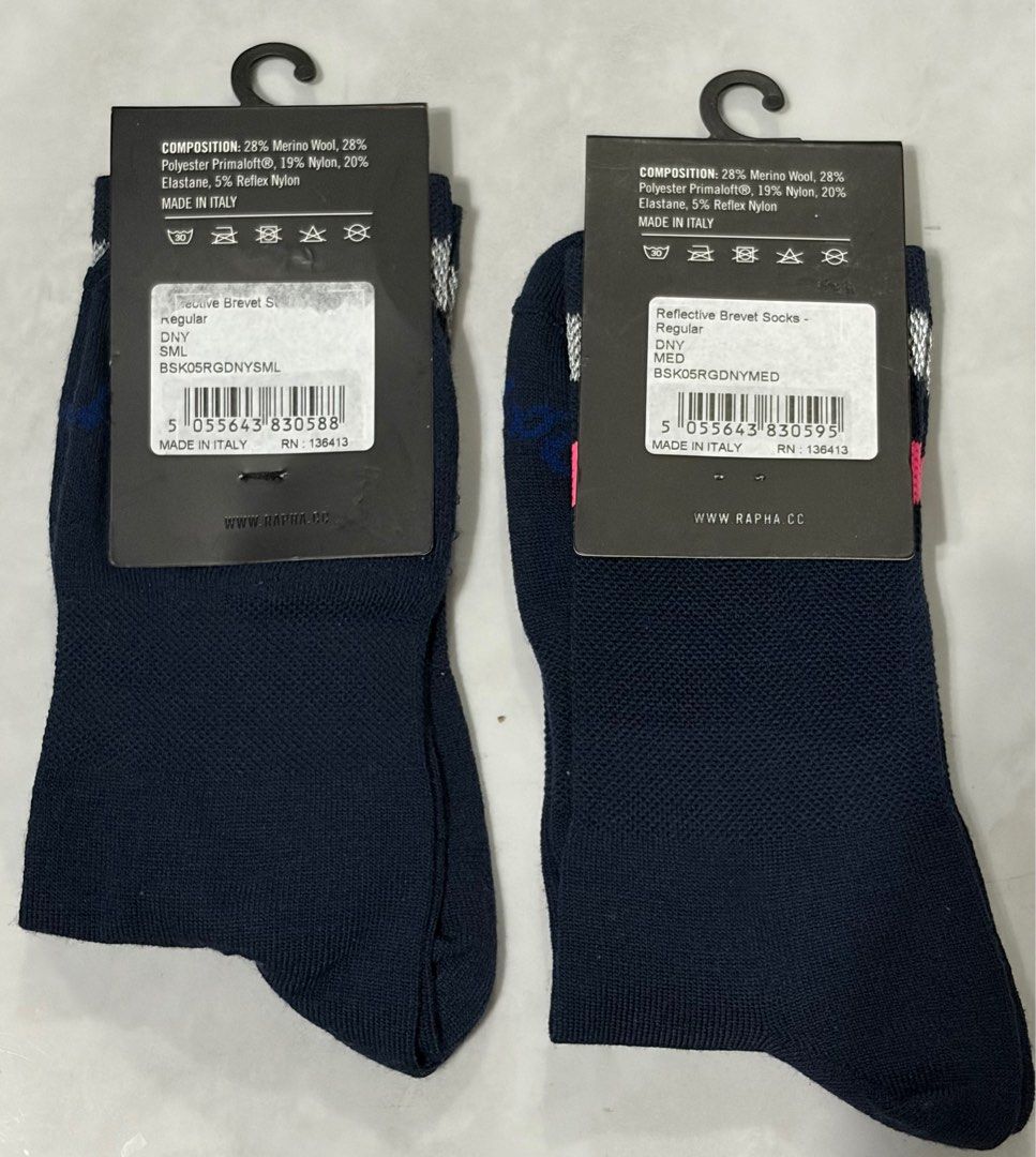 Rapha Reflective Brevet Socks Regular (Category: Socks) located in Taguig. Submitted by c00lafu (Listing ID 1406533247, Image 2). Description: - Rapha Brevet Socks - Color: Navy blue with pink and grey stripe - Made in Italy - Material: Merino wool blend - Sizes: Small, Medium - Designed for performance Both brand new - removed the medium ine just to check the actual socks and its reflective strip 1,400 each 2,000 for both.