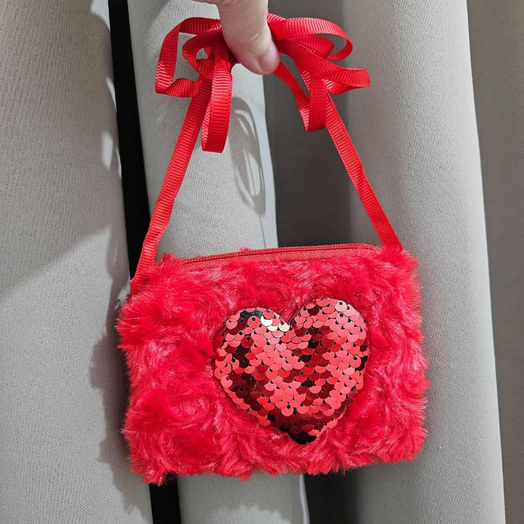 Red Heart Sequin Coin Purse/Sling Bag (Category: Babies & Kids Fashion) located in Las Pinas. Submitted by garage99 (Listing ID 1406598558, Image 2). Description: -Brand new -Can be a purse or sling bag -RFS: Decluttering -MOP: Seabank/RCBC/Gcash -Delivery via J&T, Lalamove, Grab, etc..