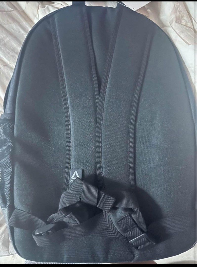 Reebok Training Backpack DU3002 Black (Category: Backpacks) located in Quezon City. Submitted by shelopez (Listing ID 1406611816, Image 2). Description: P850 pesos + Shipping fee REEBOK BACKPACK ORIGINAL ‼️‼️‼️ FROM JAPAN BRAND NEW Y4,000 yen or P1800 pesos original price! Location: North Fairview or Tomas Morato, Quezon City - Reebok backpack in black - Features the Reebok logo - Main compartment for storage - Front pocket for easy access - Adju