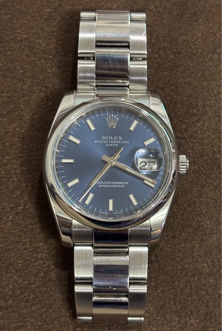 Rolex Oyster Perpetual Date Blue Dial (Category: Luxury Watches) located in Quezon City. Submitted by shopwithmycloset (Listing ID 1406572090, Image 1). Description: Authentic Rolex Oyster Perpetual 2010 Reference no. 115200 34mm automatic 7.5 wrist size Stainless steel case and bracelet Sapphire glass Blue dial Rolex clasp Watch Only No low baller pls .