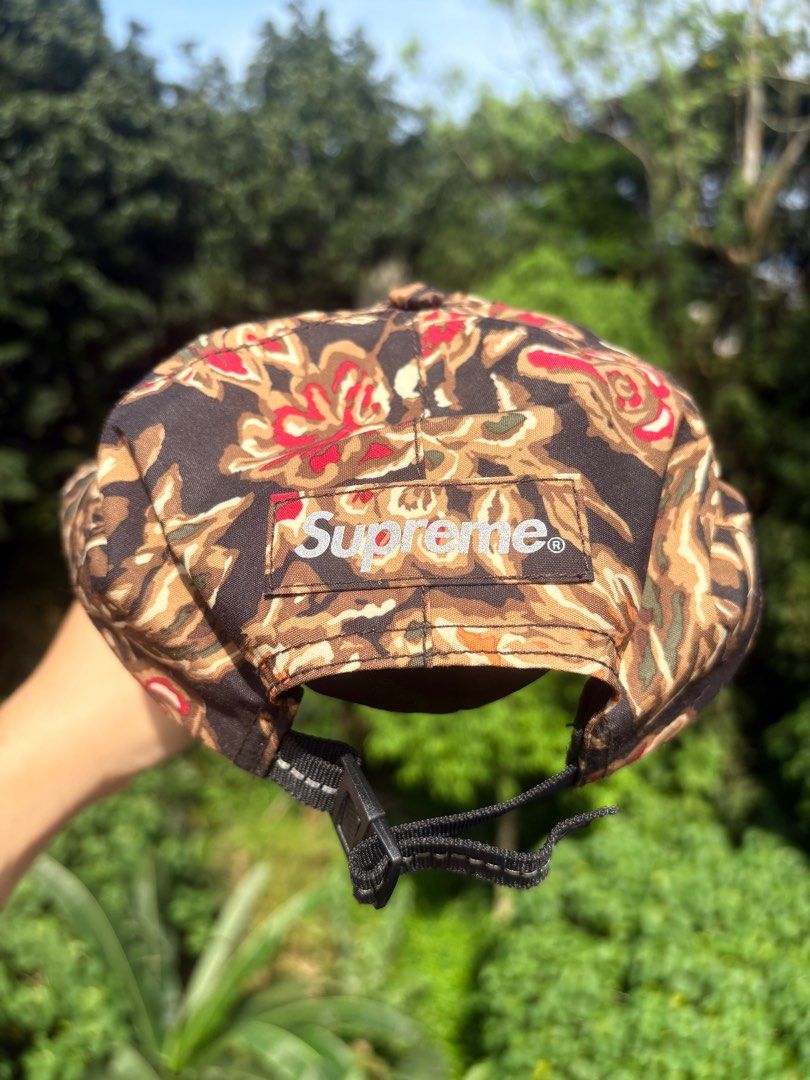 Supreme Gore-Tex Floral Cap FW2018 (Category: Caps & Hats) located in Quezon City. Submitted by sssourceee (Listing ID 1406475301, Image 3). Description: Rare Gorpcore Supreme 6-panel Gore-Tex cap featuring a floral pattern. It has a reflective Gore-Tex label on the front and a reflective Supreme logo at the back. The cap has a black strap closure with reflective strip stitching. The interior is black with mesh. The cap has a crispy flat brim. On