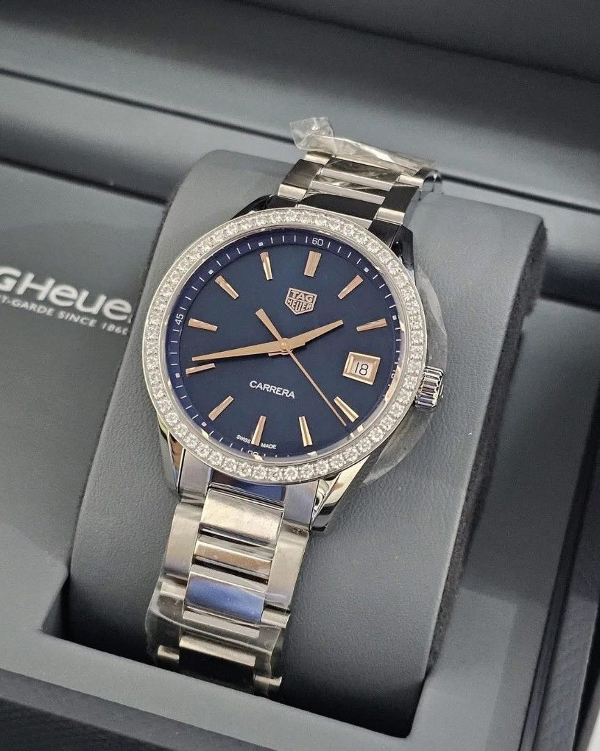 TAG Heuer Carrera Diamond Bezel Watch (Category: Luxury Watches) located in Manila. Submitted by maricelbal37348 (Listing ID 1406572628, Image 3). Description: - TAG Heuer Carrera watch - Stunning blue dial - Diamond-encrusted bezel - Stainless steel bracelet - Date display - Includes original box and documentation - Perfect for any occasion 101% ORIGINAL Tag Heuer Carrera Model Wbk-1317 Real Diamonds 36mm 5x money back if fake 2 years warranty s