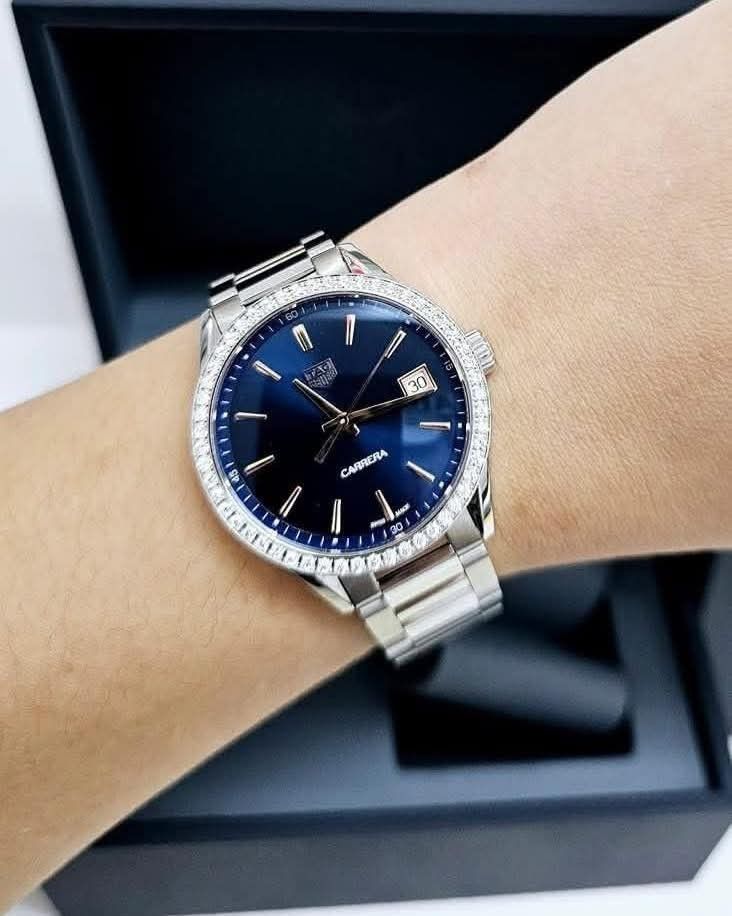TAG Heuer Carrera Diamond Bezel Watch (Category: Luxury Watches) located in Manila. Submitted by maricelbal37348 (Listing ID 1406572628, Image 1). Description: - TAG Heuer Carrera watch - Stunning blue dial - Diamond-encrusted bezel - Stainless steel bracelet - Date display - Includes original box and documentation - Perfect for any occasion 101% ORIGINAL Tag Heuer Carrera Model Wbk-1317 Real Diamonds 36mm 5x money back if fake 2 years warranty s