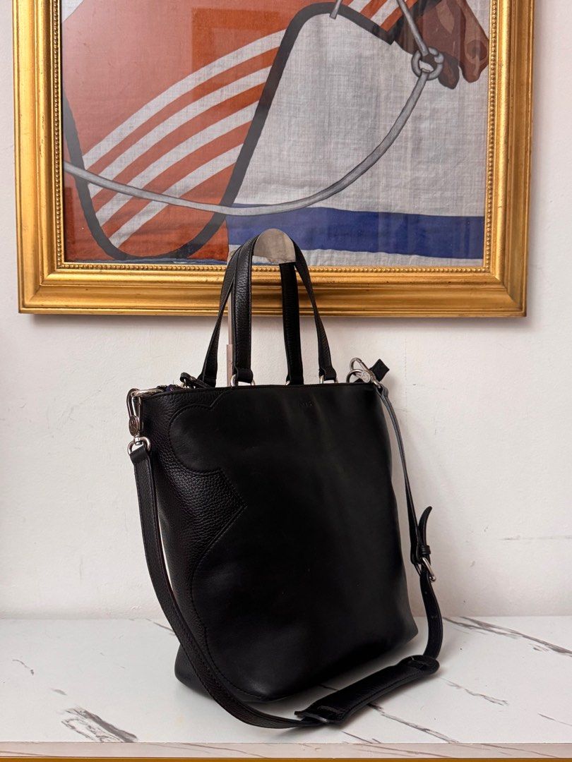 Tous genuine leather 2way bag (Category: Luxury Bags & Wallets) located in Rizal. Submitted by houseofbell (Listing ID 1406518019, Image 2). Description: Excellent condition No flaws Made genuine leather material 11.5x13 inches.